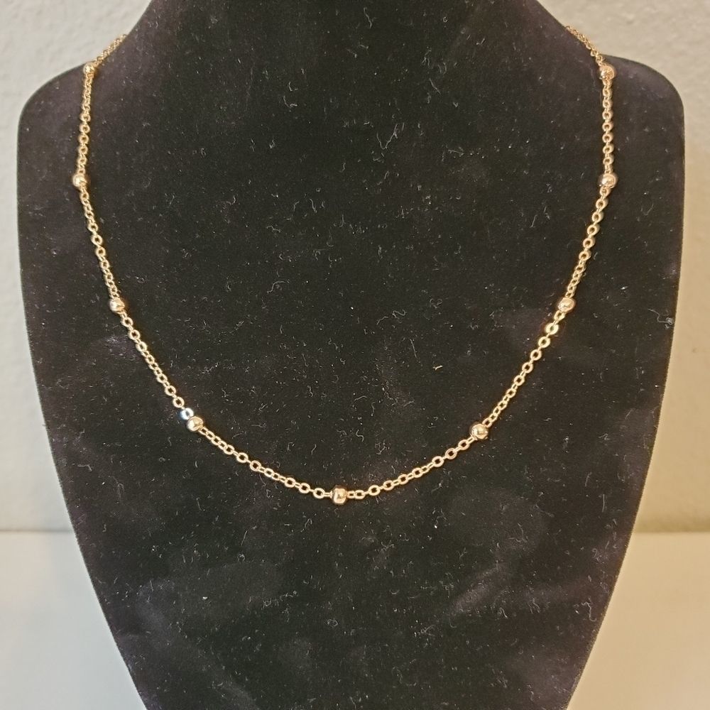 Gold tone princess necklace
